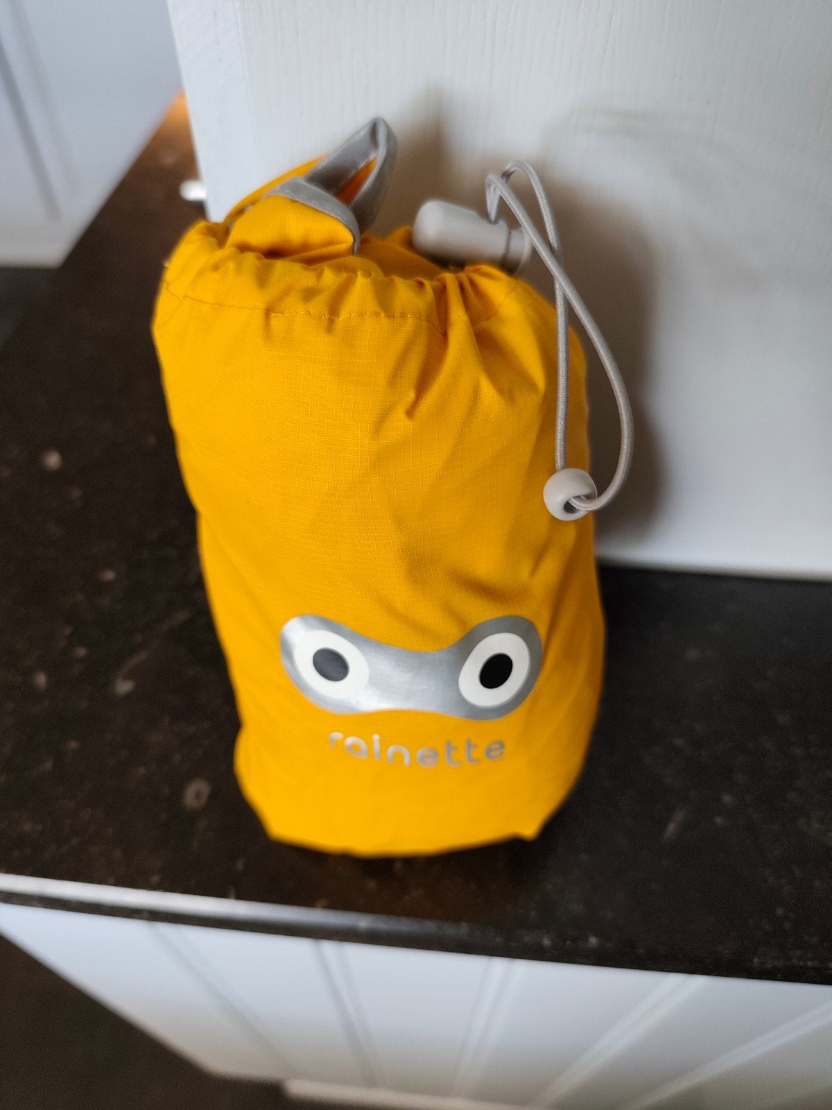 Rainette Regenponcho, Ophalen