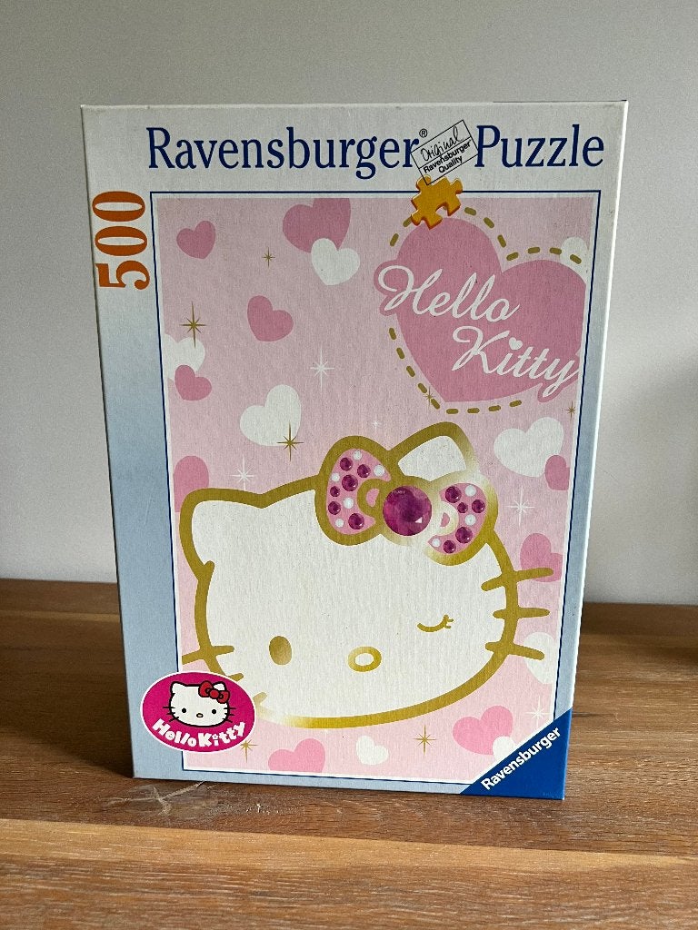 Puzzel Ravensburger - Sprankelende Hello Kitty, Hobby & Loisirs créatifs, Sport cérébral & Puzzles, Enlèvement ou Envoi, 500 à 1500 pièces