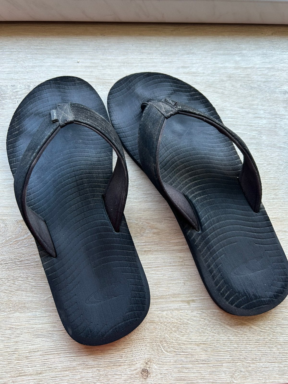 O’neil teenslippers, Ophalen, Gedragen