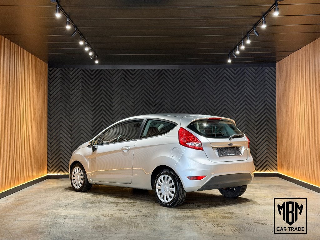 ✅ Ford Fiesta 1.25i | Airco | 12 Maanden GARANTIE | Isofix, Voorwielaandrijving, Euro 5, Stof, Bedrijf