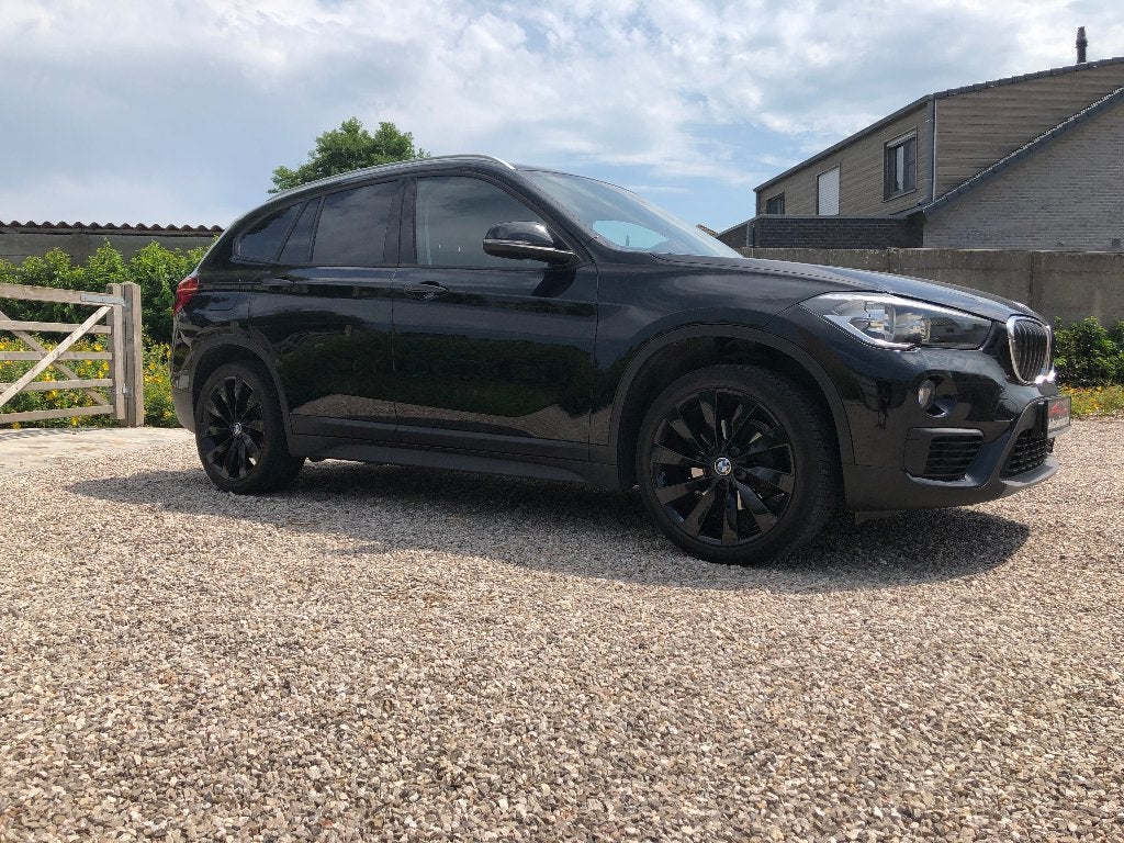 bmw x1 benzine automaat met garantie, Zwart, Bedrijf, 5 zetels, 5 deurs