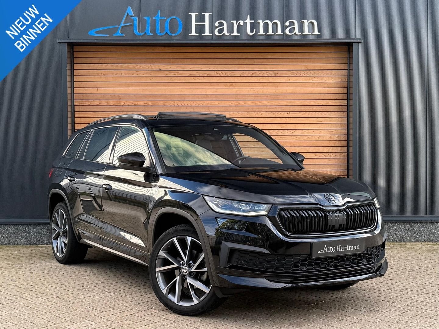 Skoda Kodiaq 1.5 TSI Sportline Business SPORTSTOELEN|TREKHAA, Auto's, Automaat, 164 g/km, Zwart, Bedrijf