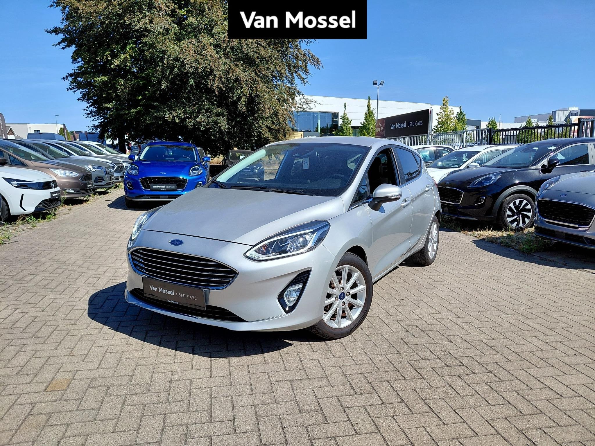 Ford Fiesta 1.1i 63kW Titanium, Auto's, Voorwielaandrijving, Stof, Automatische klimaatregeling, https://public.car-pass.be/vhr/b7b5220b-9bd7-4663-adda-66510f6b10d3