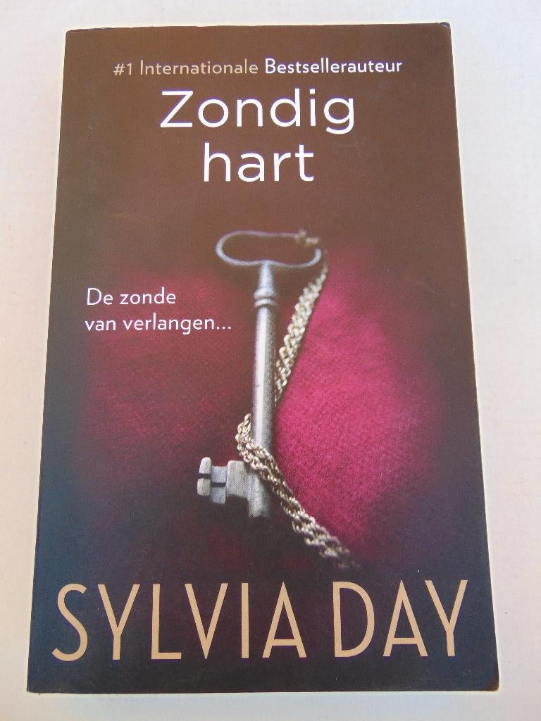 Boek: Zondig hart- De zonde van verlangen... - Sylvia Day, Boeken, Romans, Zo goed als nieuw, Ophalen of Verzenden