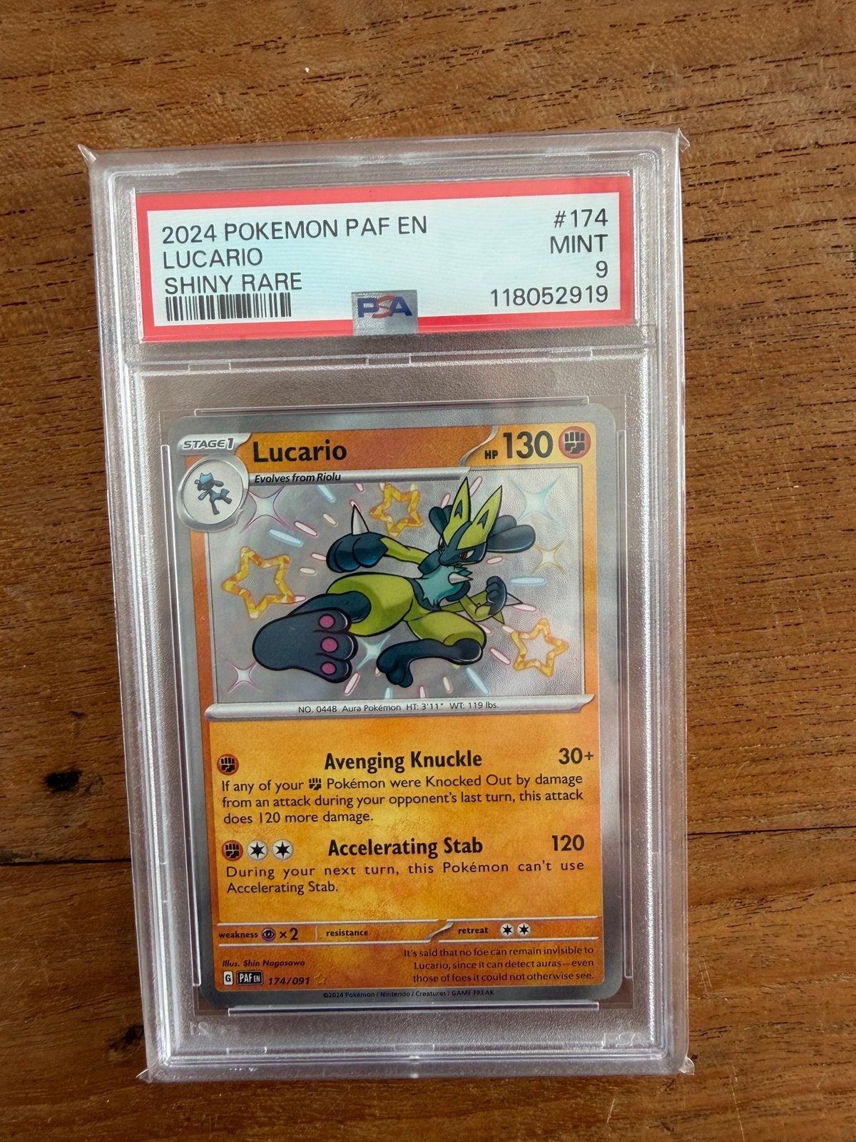Lucario 174 Paldean Fates PSA 9, Ophalen of Verzenden, Zo goed als nieuw