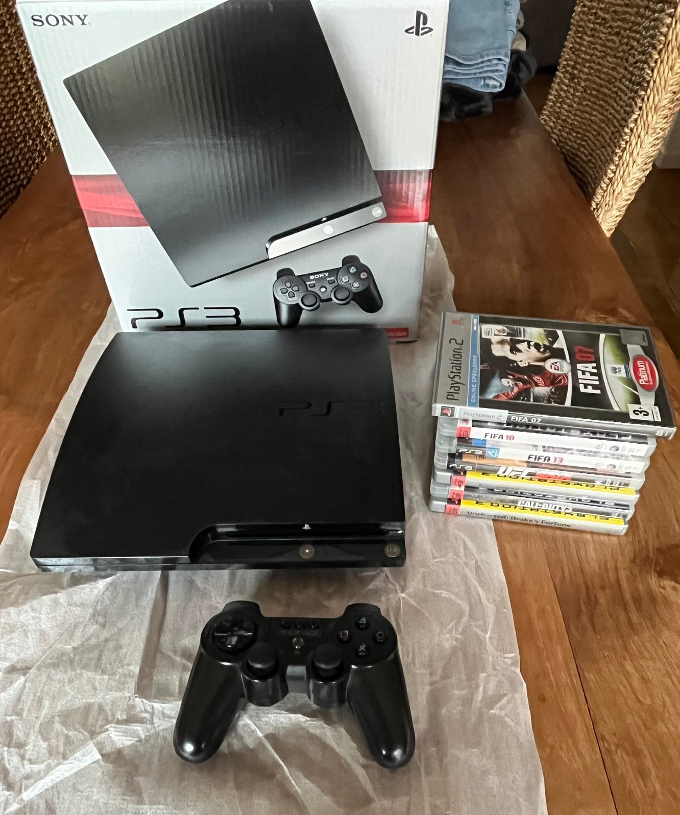 Sony PlayStation 3, DualShock 3 draadloze controller + games, PlayStation 3, Ophalen of Verzenden, Zo goed als nieuw, Controller