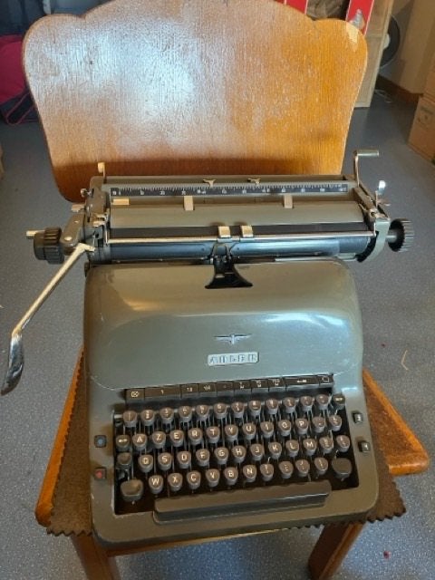 Retro Adler typemachine, Ophalen