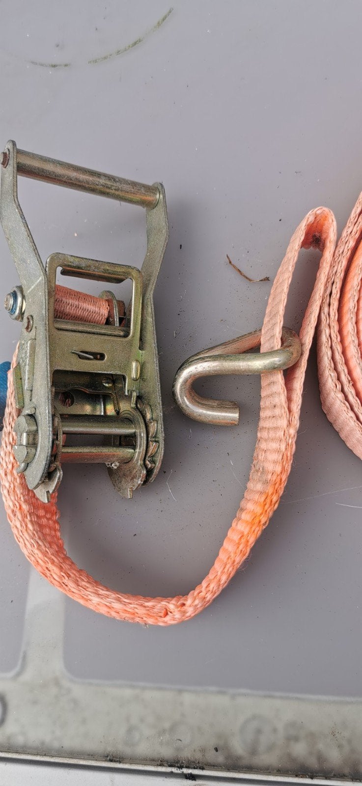 Spanband met ratel, Ophalen