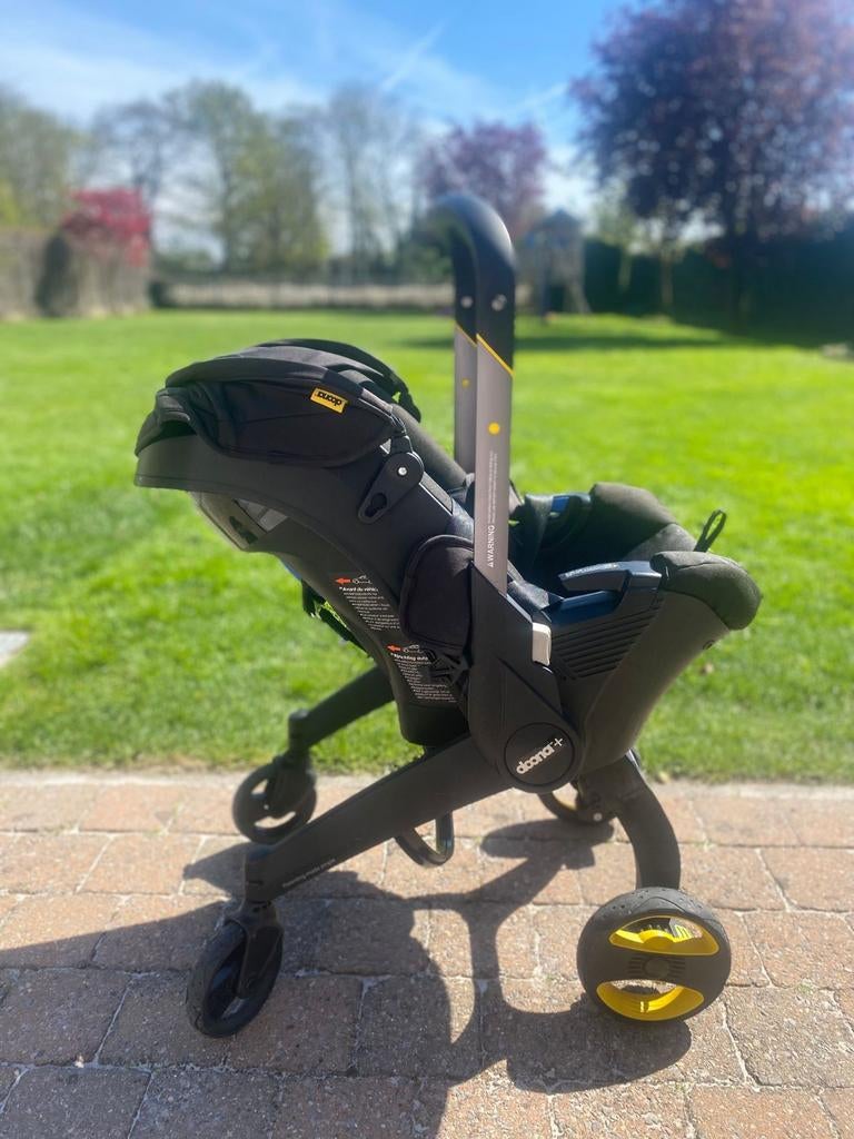 Doona + autostoel / buggy (2 in 1) + regenhoes, Ophalen