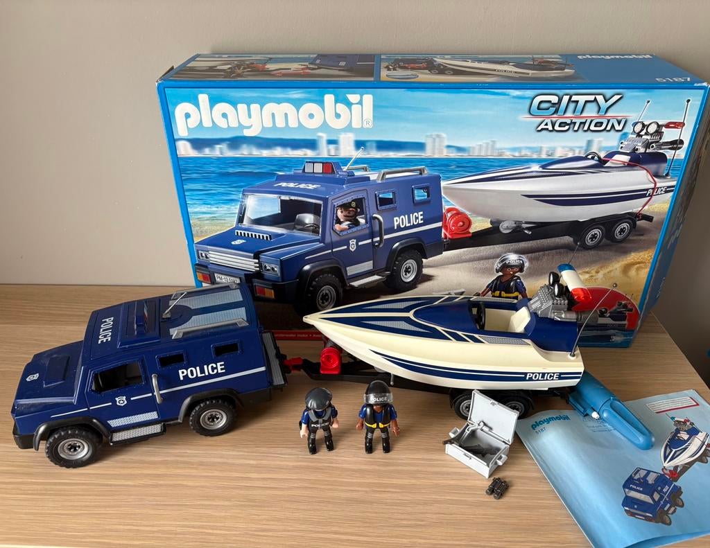 5187 politietruck met speedboot, Kinderen en Baby's, Speelgoed | Playmobil, Ophalen of Verzenden, Zo goed als nieuw