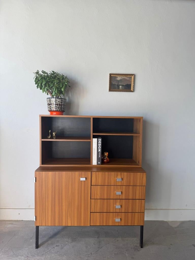 Vintage Meurop, Pierre Guariche boekenkast 2-delig, Ophalen, Zo goed als nieuw, 25 tot 50 cm, Met deur(en)