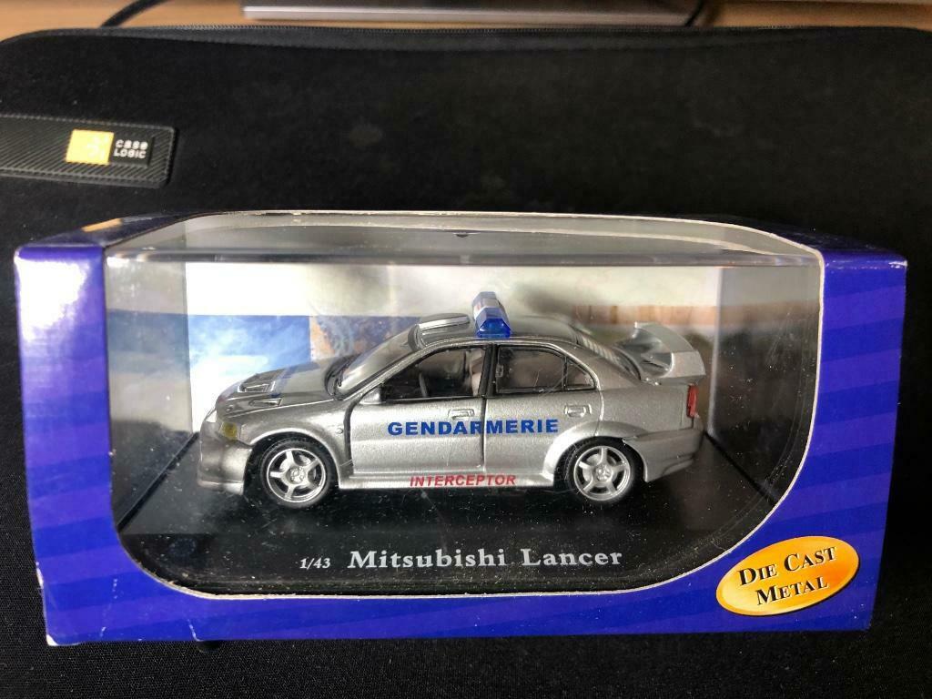 AMERICAN MINT Mitsubishi Lancer Evo Gendarmerie Interceptor, Ophalen of Verzenden, Zo goed als nieuw, Auto