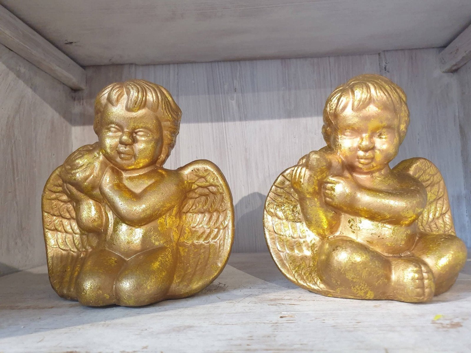 twee engelen beeldjes, Enlèvement ou Envoi