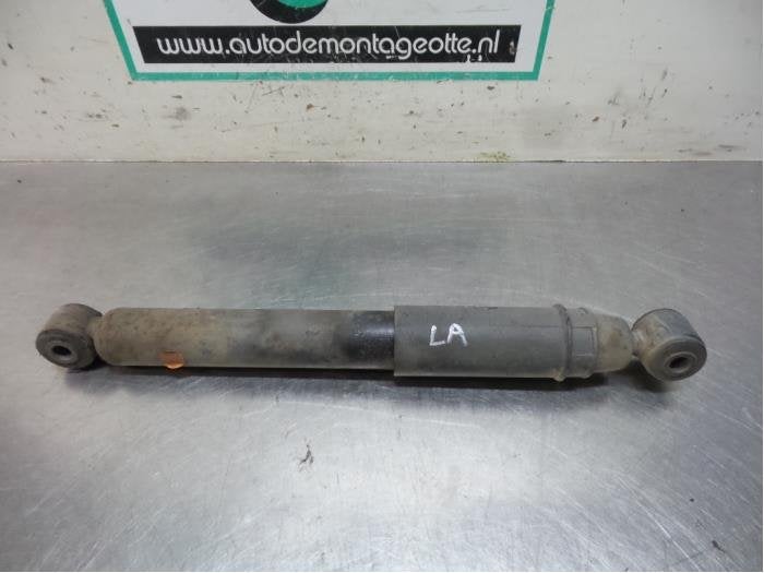Amortisseur arrière gauche d'un Nissan Kubistar (Kubistar 0, -, 3 mois de garantie, Utilisé, -