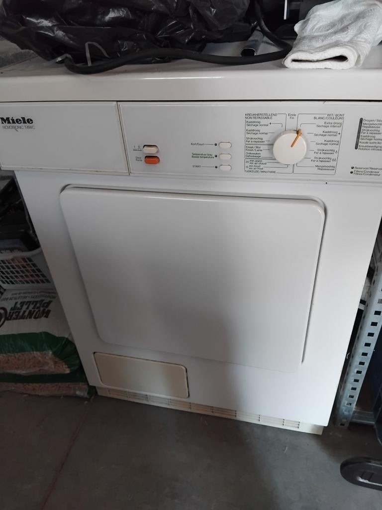 Miele droogkast, Ophalen