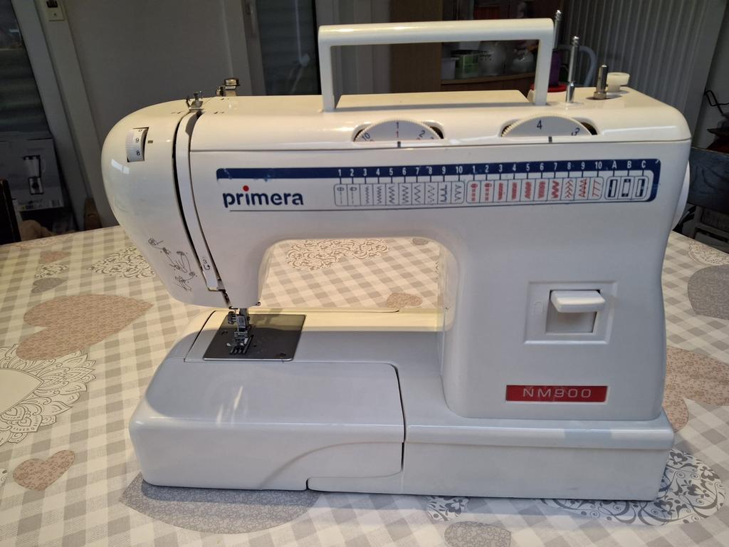 Naaimachine, Ophalen, Naaimachine