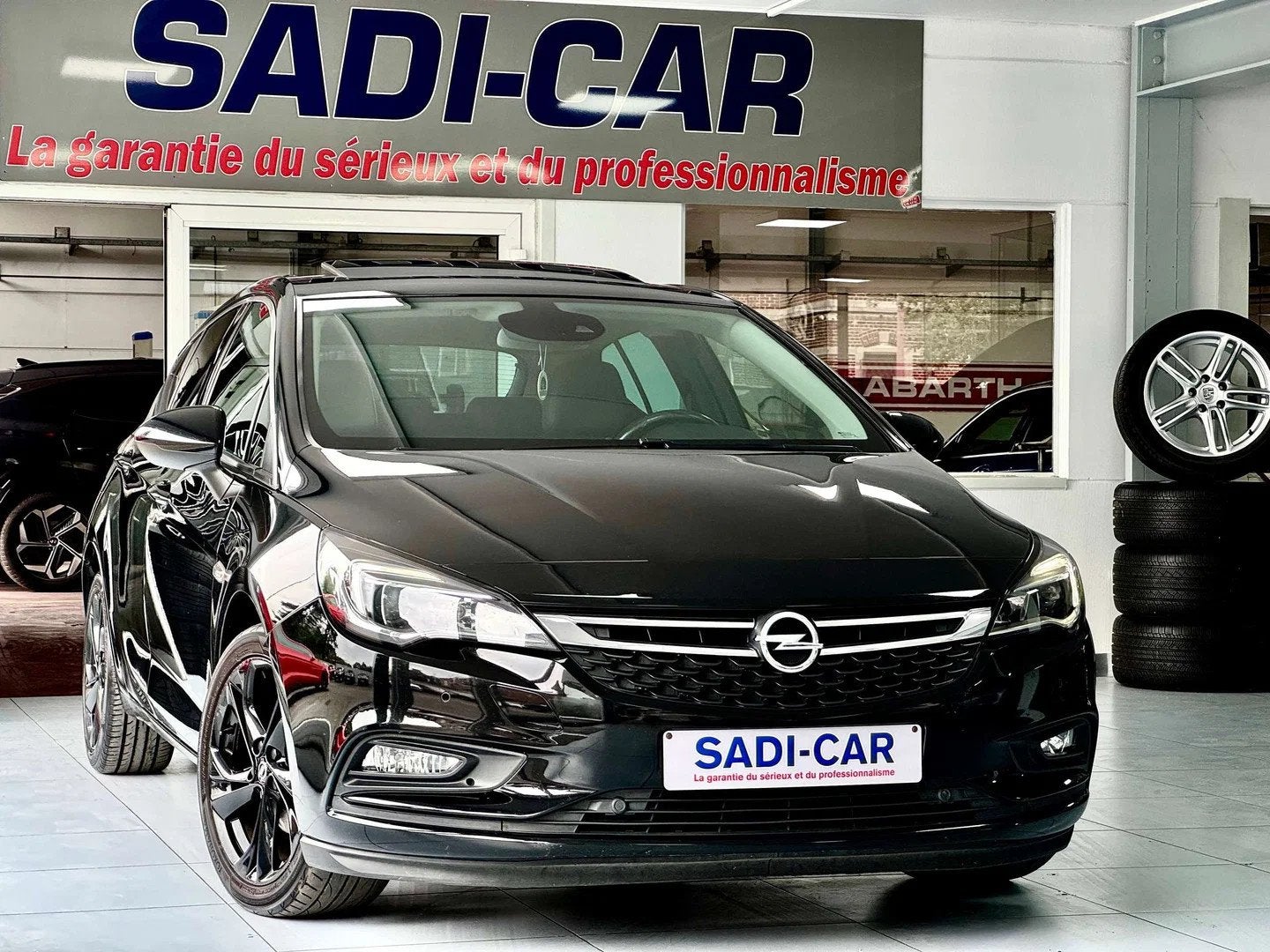 Opel Astra 1.0 Turbo 105cv ECOTEC Innovation Start/Stop - 5, Auto's, Opel, 105 pk, Gebruikt, Zwart, Leder