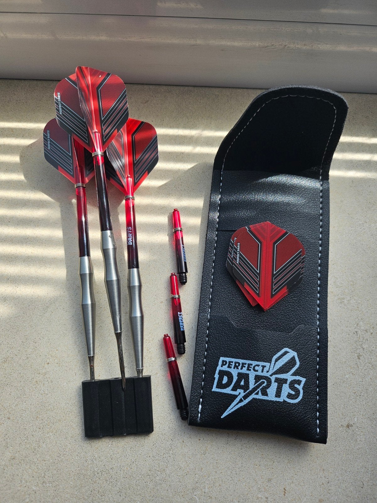 Perfect darts 24 gram, Ophalen