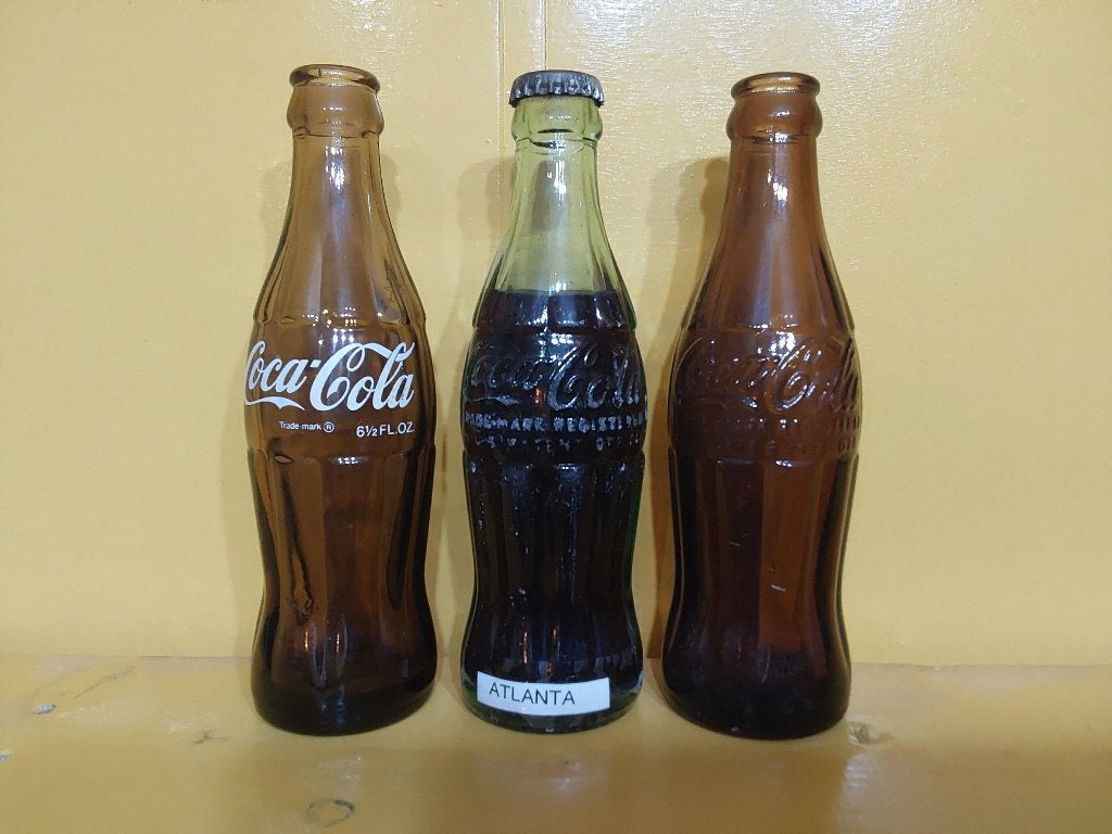 Coca Cola flessen 3 stuks USA 2xleeg en 1 volle, Verzamelen, Ophalen of Verzenden, Gebruikt