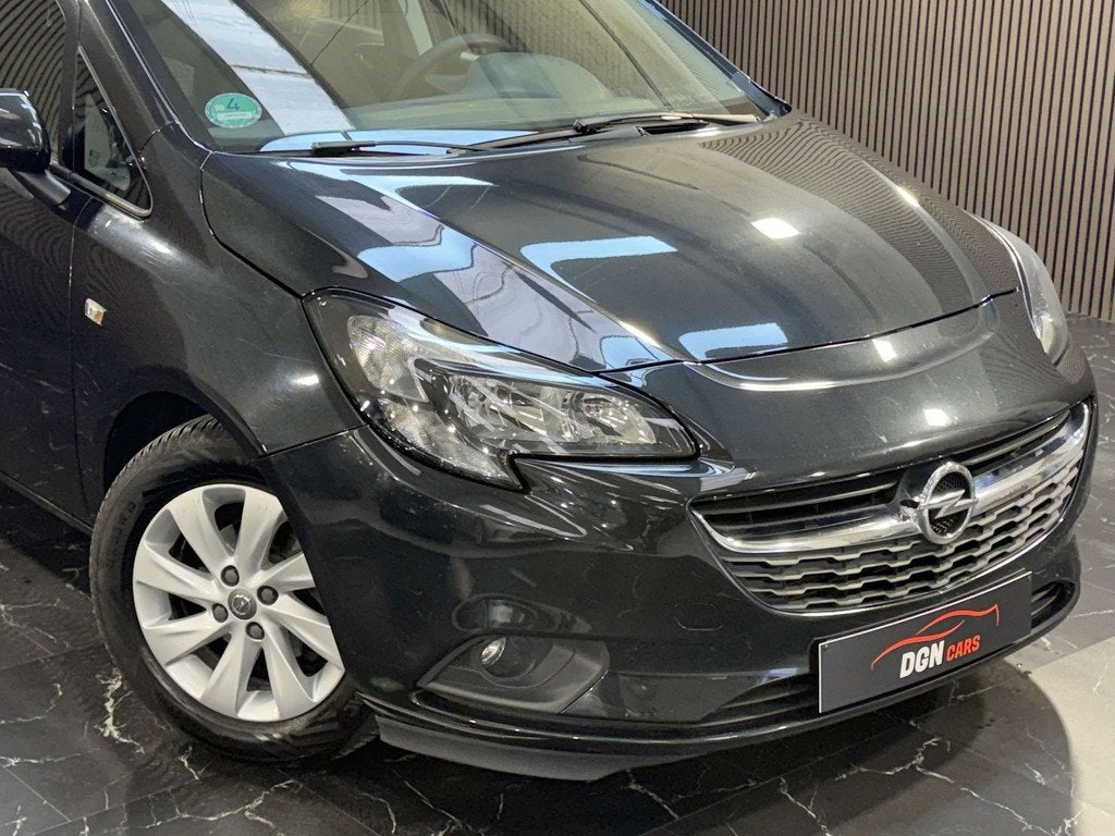 Opel Corsa Corsa 1.4i Black Edition (bj 2015), Auto's, Stof, Gebruikt, 4 cilinders, Zwart