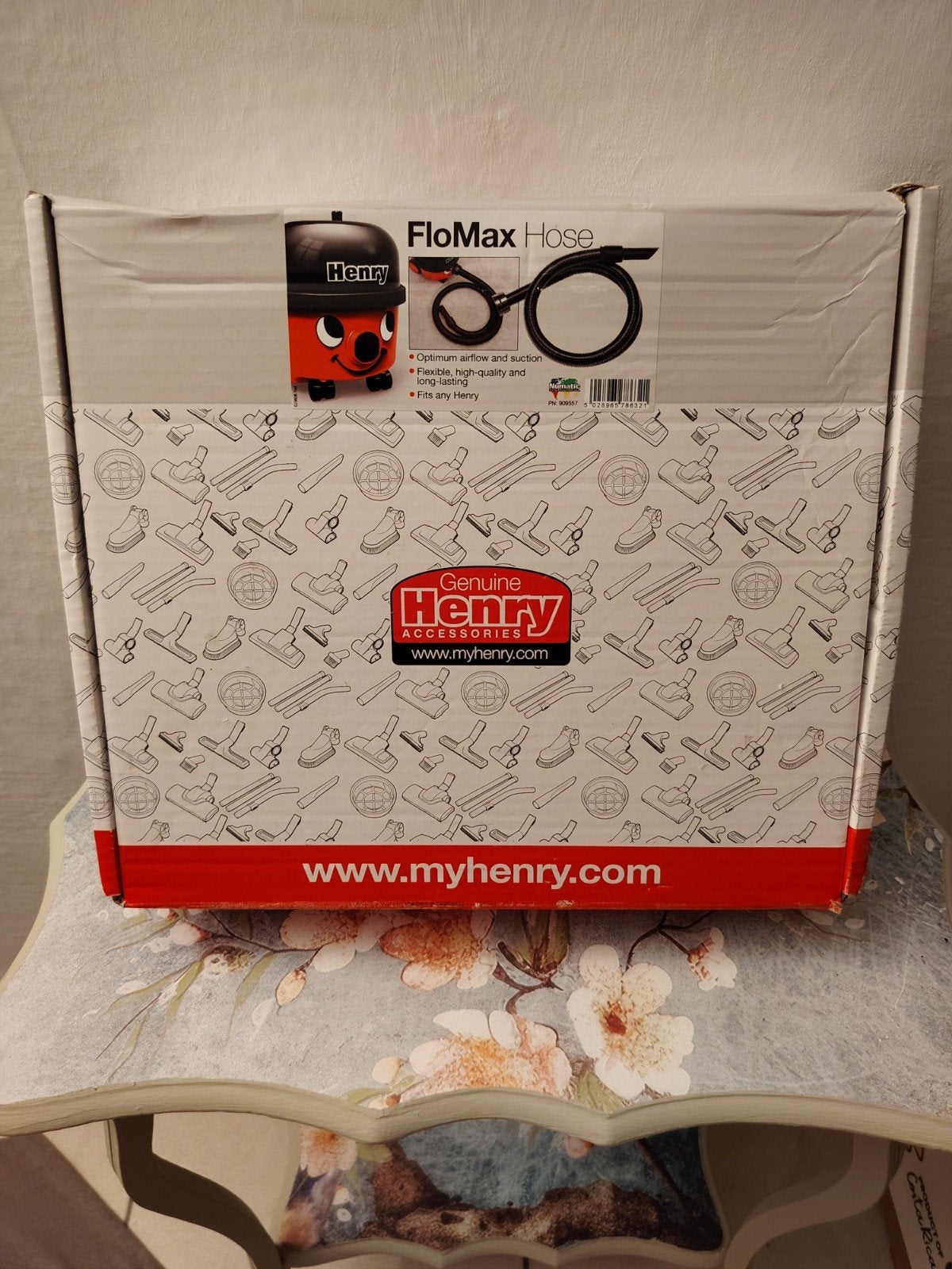 Henry flomax stofzuigslang, Ophalen
