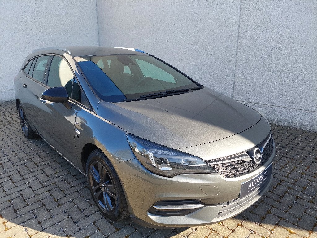 OPEL ASTRA SPORTS TOURER CAMERA-TREKHAAK-NAVI-12M GARANTIE, Dealer onderhouden, Euro 6, https://public.car-pass.be/vhr/133025fd-ec62-4cc6-b0d1-5df36a33ed59