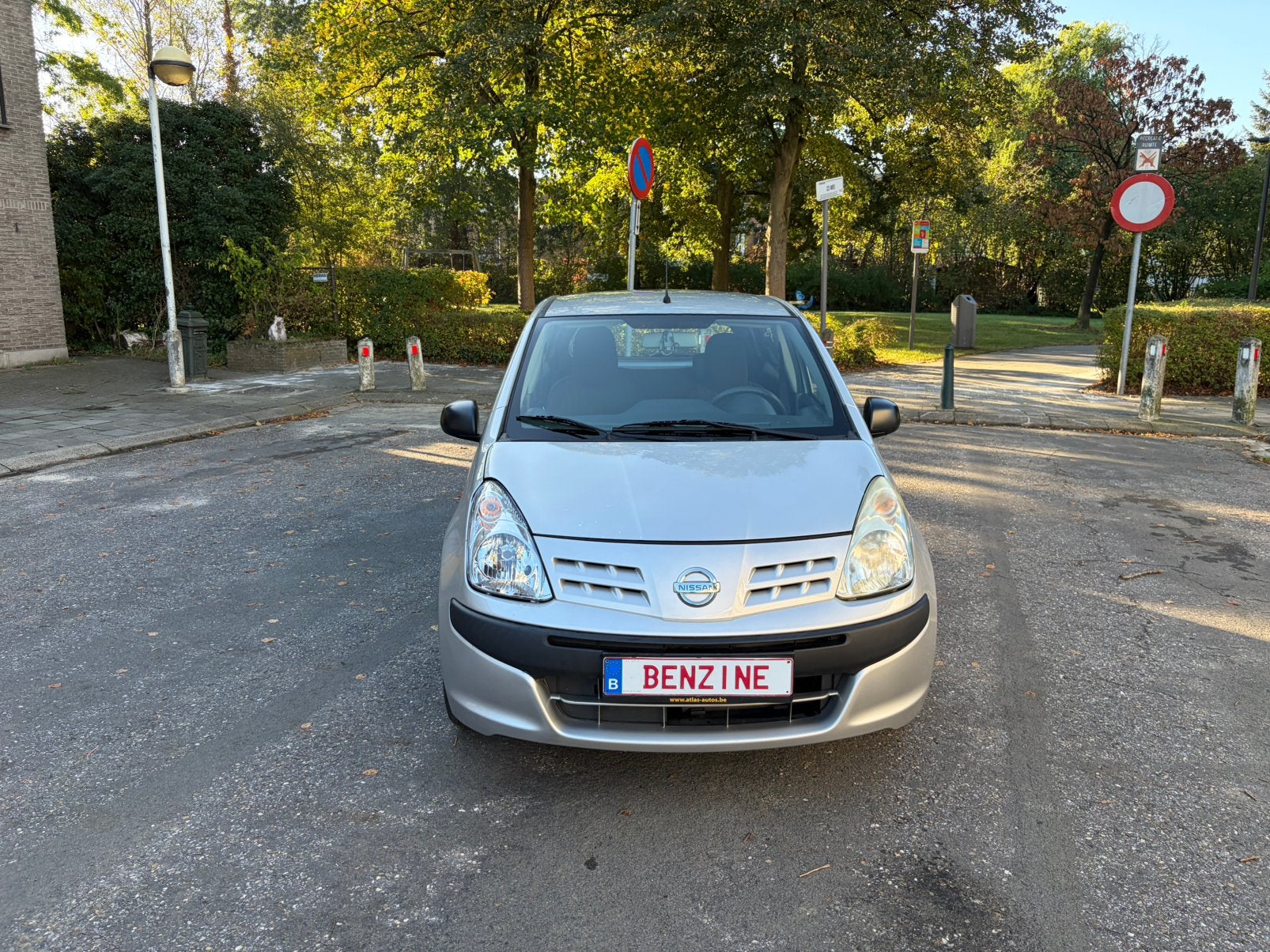 Nissan Pixo 1.0 benz 103506 km 2012 garantie, Auto's, Stof, 50 kW, Zwart, Handgeschakeld