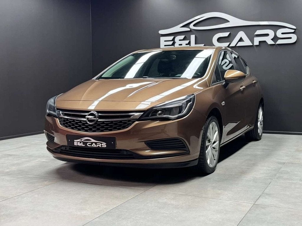 Opel Astra Astra 1.4i *12 mois de garantie* (bj 2017), Auto's, Opel, Stof, Gebruikt, Zwart, 4 cilinders