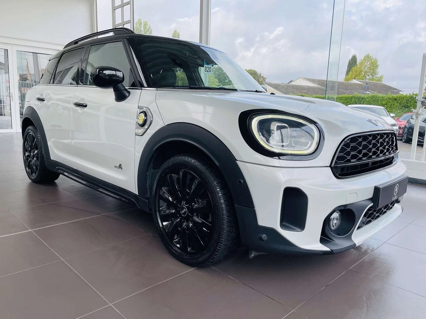 MINI Countryman Cooper SE 1.5iA PHEV ALL4 * GARANTIE + LED +, Auto's, Gebruikt, Countryman, Wit, Leder