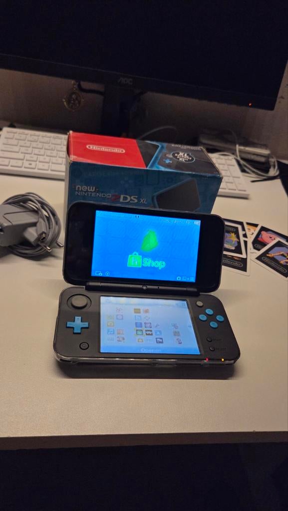 Nintendo 2DS XL(Jailbroken) + oplader + bescherming Topstaat, Games en Spelcomputers, Ophalen, 2DS