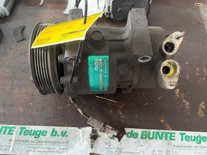 Pompe clim d'un Peugeot 206, -, 3 mois de garantie, Utilisé, -