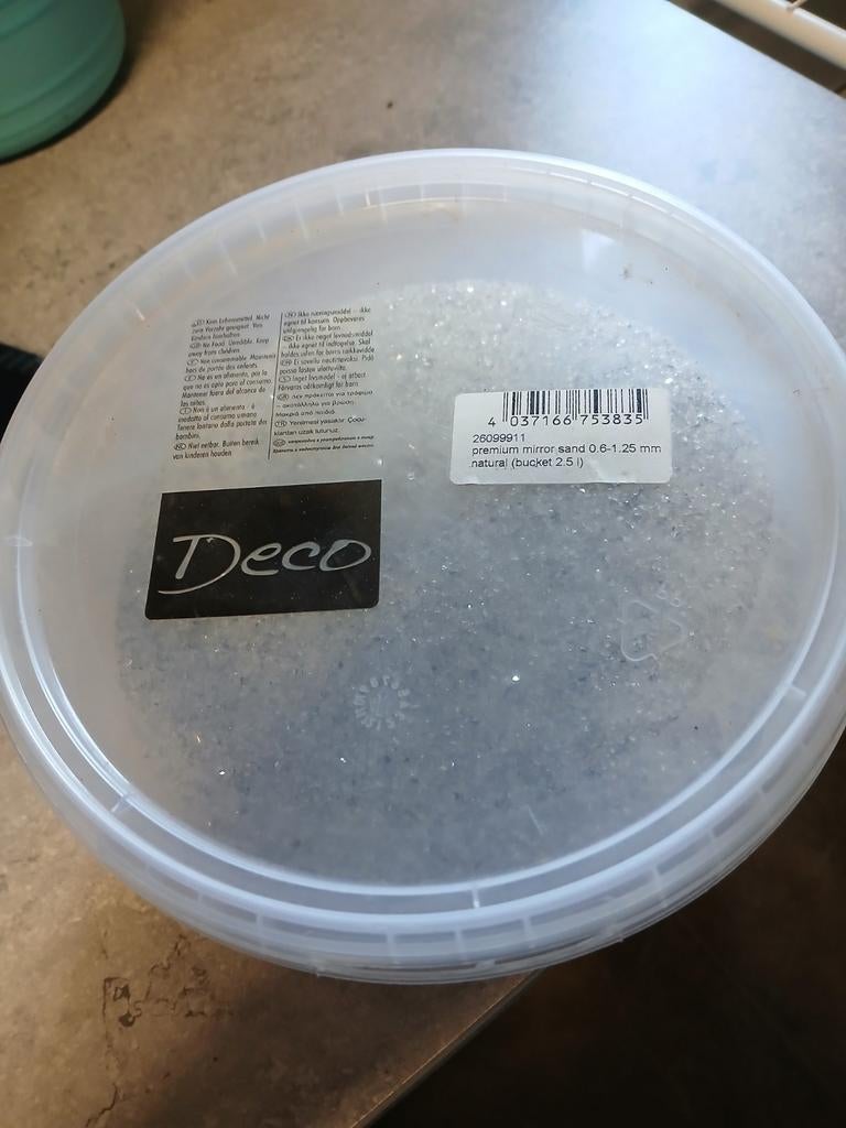 Decoratiemateriaal zand, Ophalen
