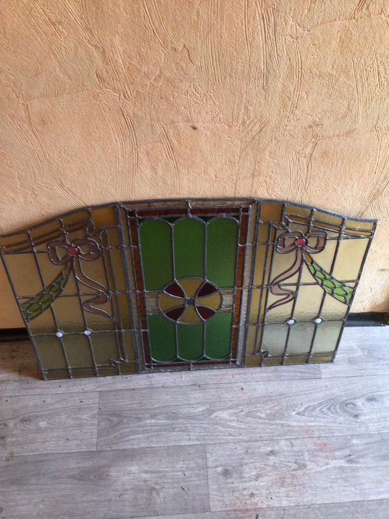 Antiek gekleurd glasraam, Ophalen
