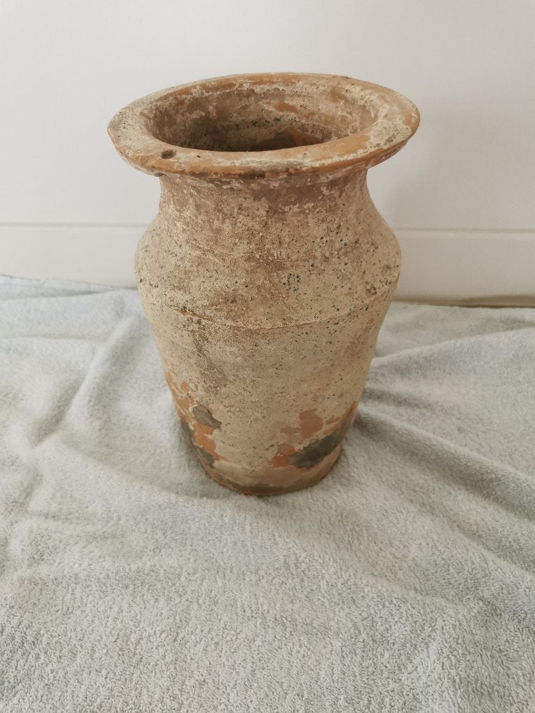 Aziatische ongeglazuurde pot, Ophalen