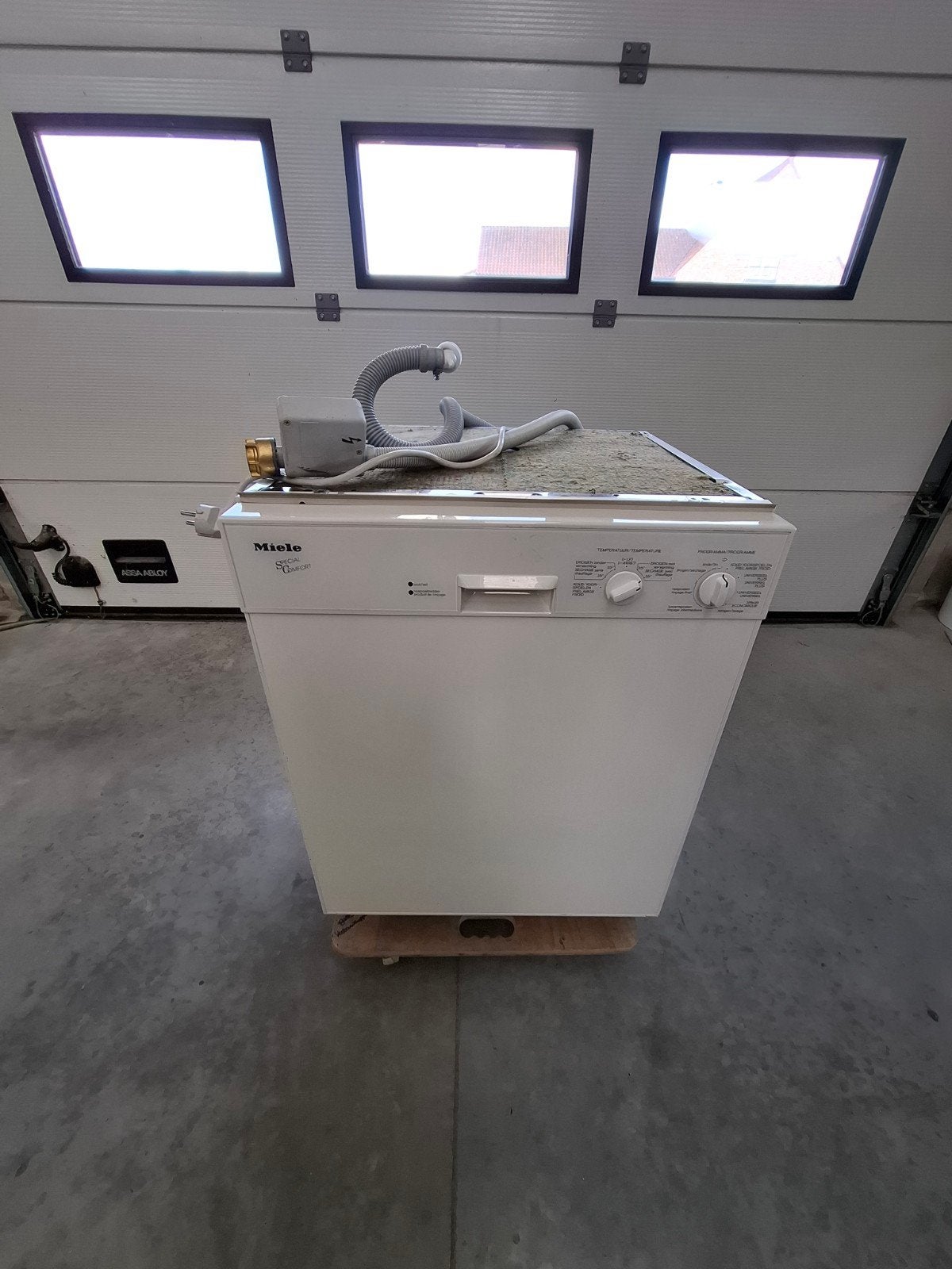 Miele vaatwasmachine, Ophalen
