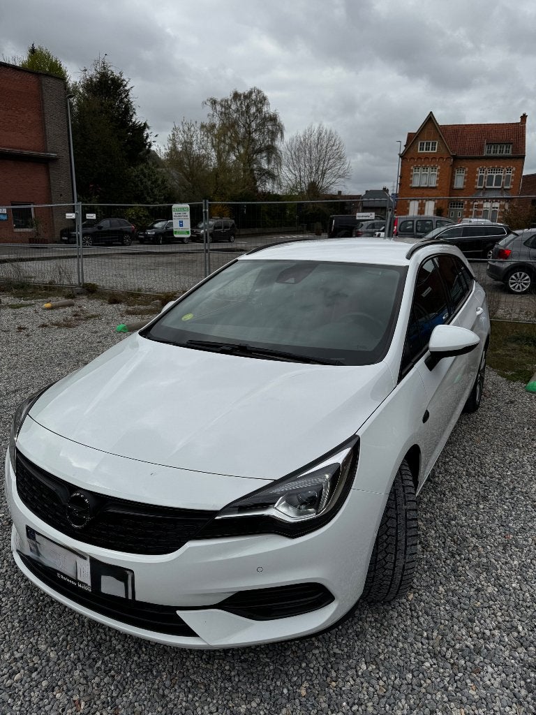 Opel Astra Sport Tourer 1.5D Ultimate 122pk Auto 9 Alcantara, Auto's, Euro 6, Alcantara, Wit, Particulier