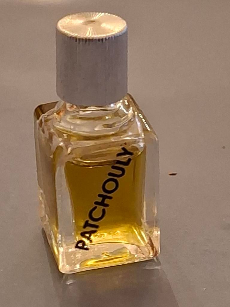 petit flacon d'huile parfumée au patchouli. Vintage, Ophalen of Verzenden, Miniatuur