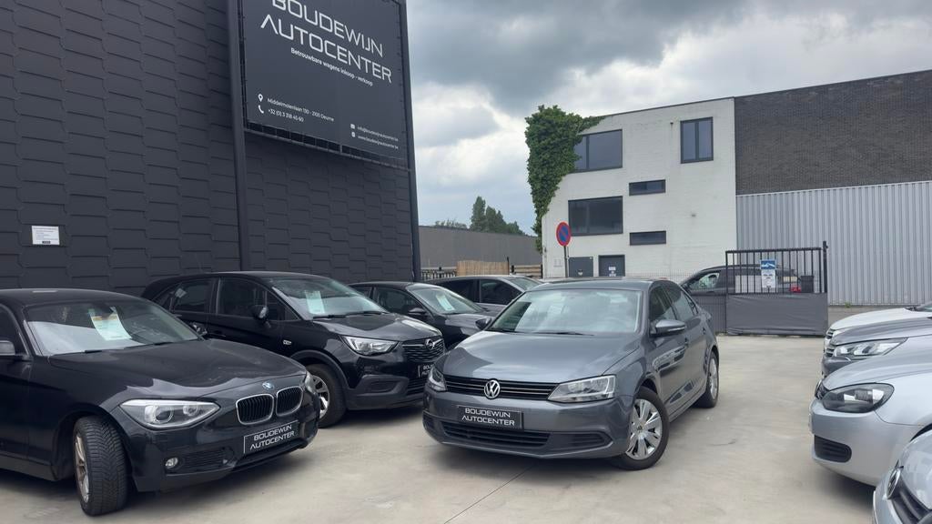 Volkswagen Jetta 2011 1.2Benzine 160.xxxkm/Airco,Sensor,Navi, Auto's, Voorwielaandrijving, Euro 5, Stof, Zwart