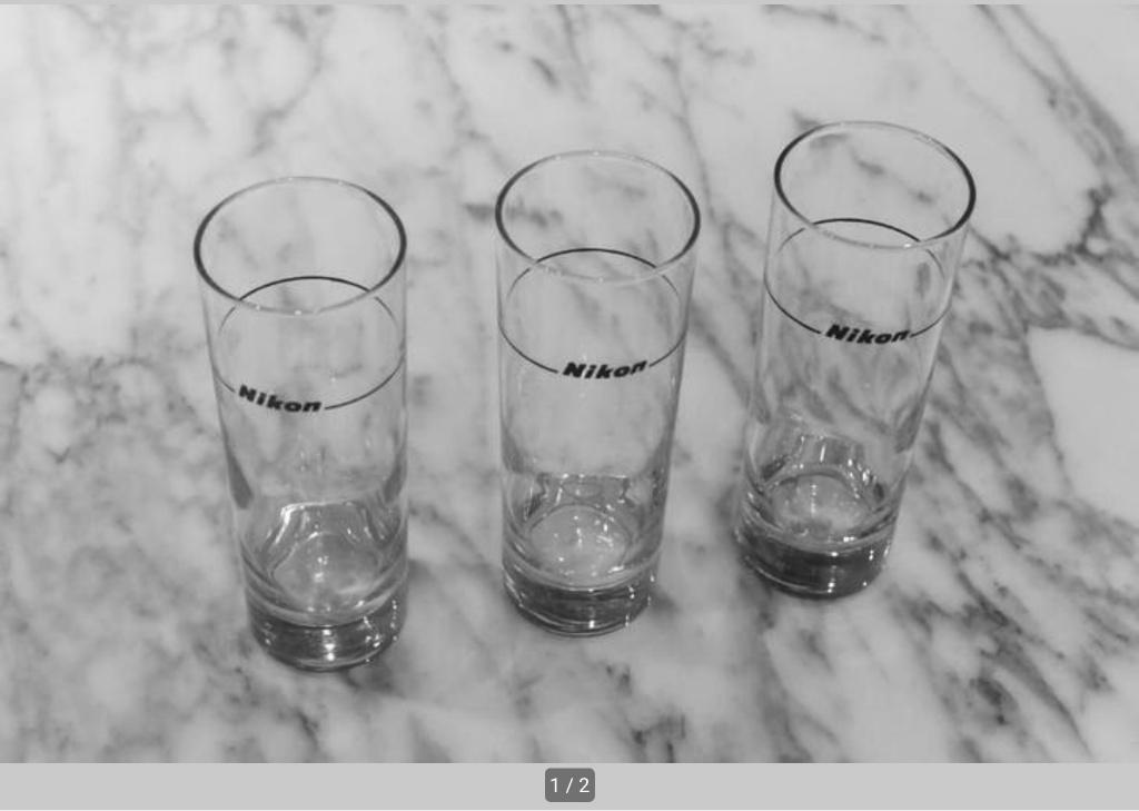 Longdrink glas met logo Nikon, Ophalen of Verzenden, Zo goed als nieuw, Borrel- of Shotglas