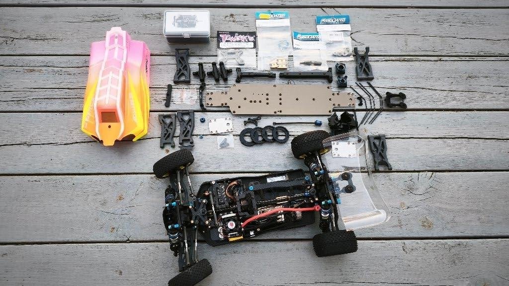 Buggy 1/10 b74 4x4 team bijbehorend + onderdelenset, Elektro, Gebruikt, Auto offroad, Ophalen of Verzenden