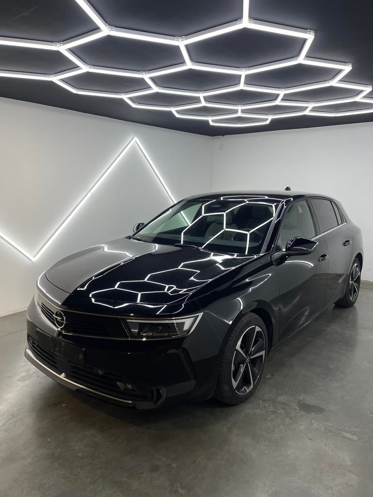 Opel Astra| 2023| SLECHTS 7.473KM| NIEUWSTAAT| GARANTIE, Auto's, Euro 6, Leder en Stof, Zwart, 1200 cc