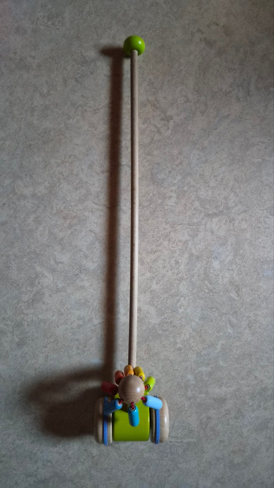 Haba 5129 Duwstok Kleurencarrousel, Ophalen