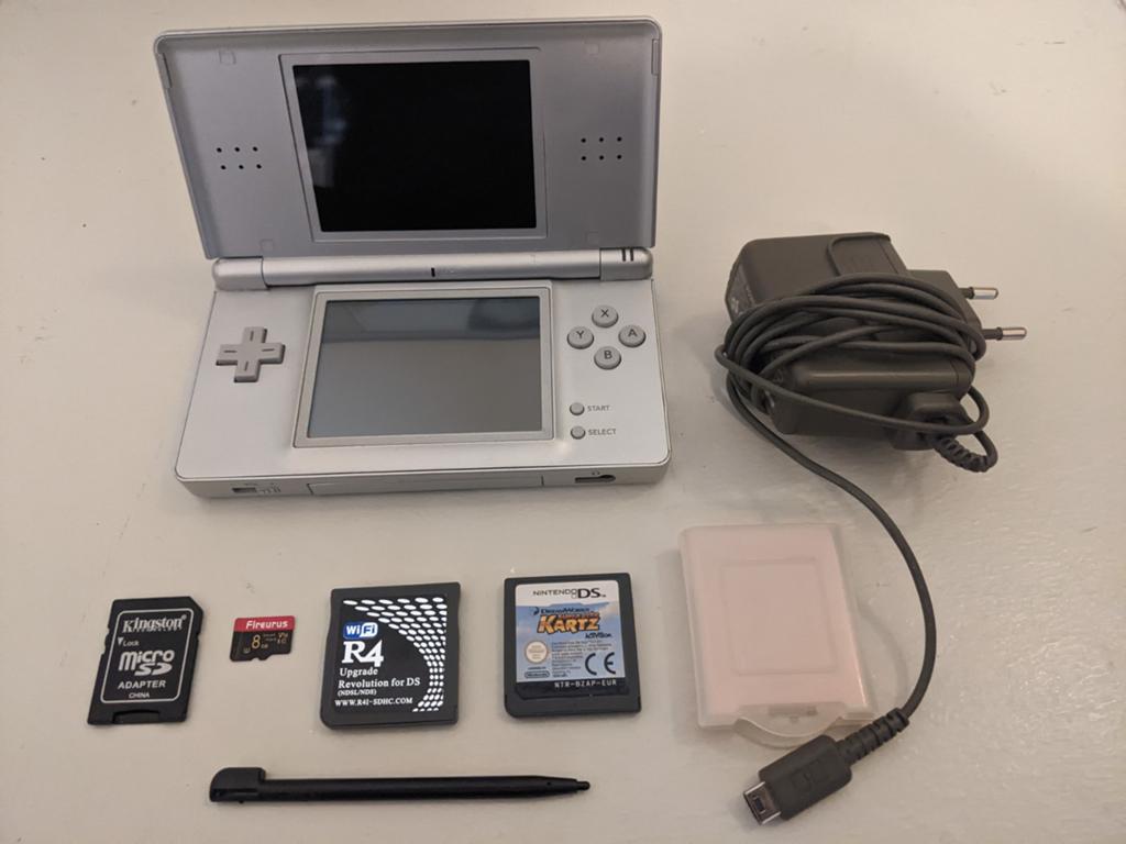Zilveren Nintendo DSL+Extra's in Zeer Goede Staat!!!, Games en Spelcomputers, Spelcomputers | Nintendo DS, Met games, Ophalen of Verzenden