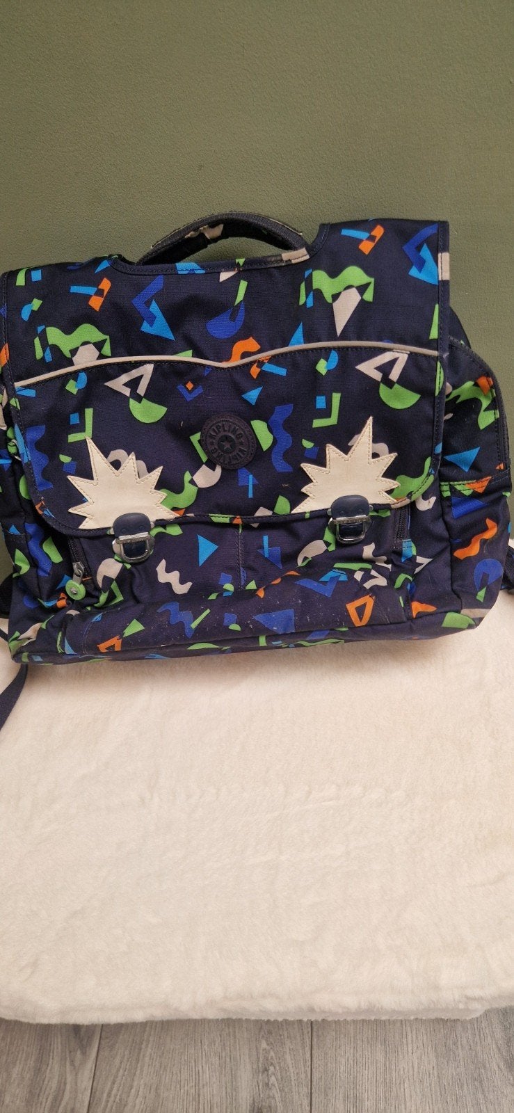 kipling boekentas, Ophalen