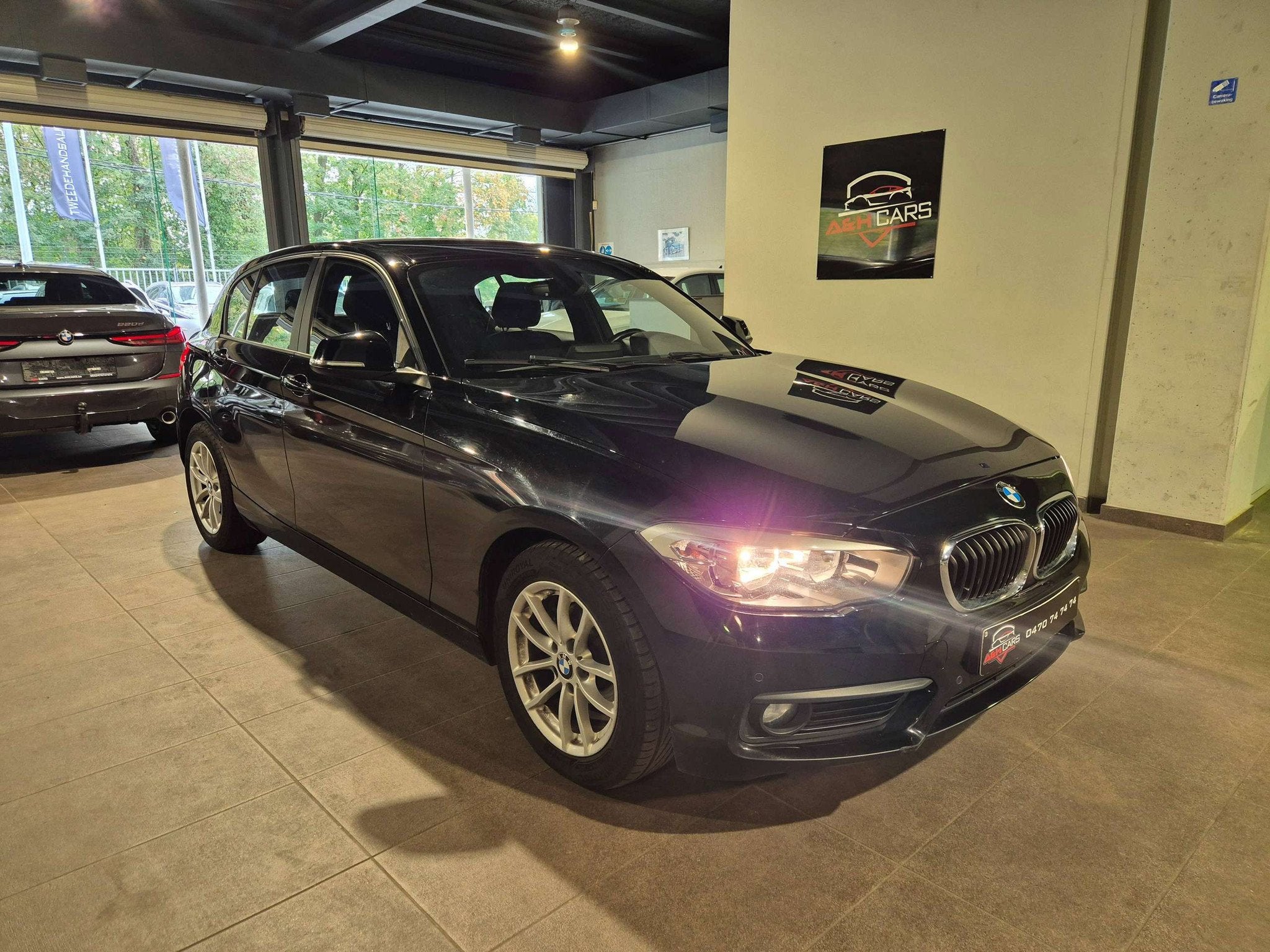 BMW 1 Serie 116 116i (bj 2016), Auto's, Voorwielaandrijving, Gebruikt, Overige brandstoffen, Zwart