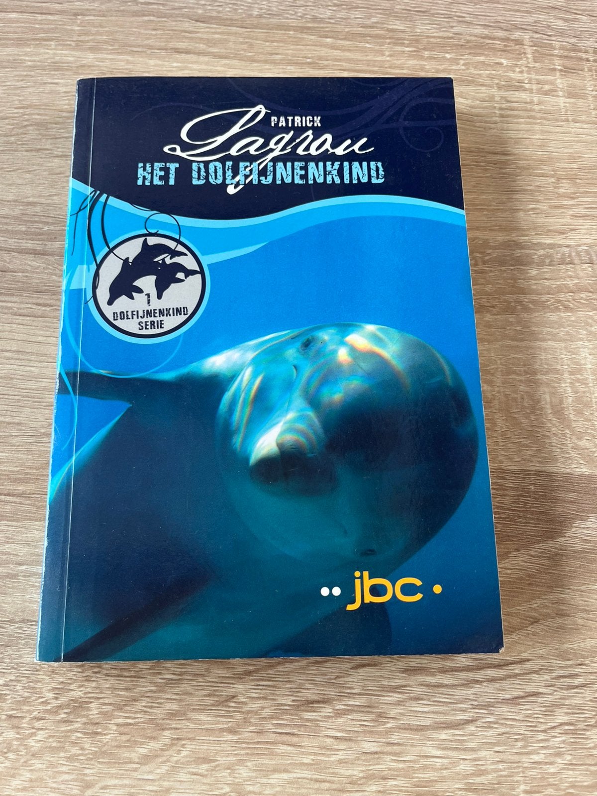 “Het Dolfijnenkind” - Patrick Lagrou, Ophalen of Verzenden, Gelezen, Fictie