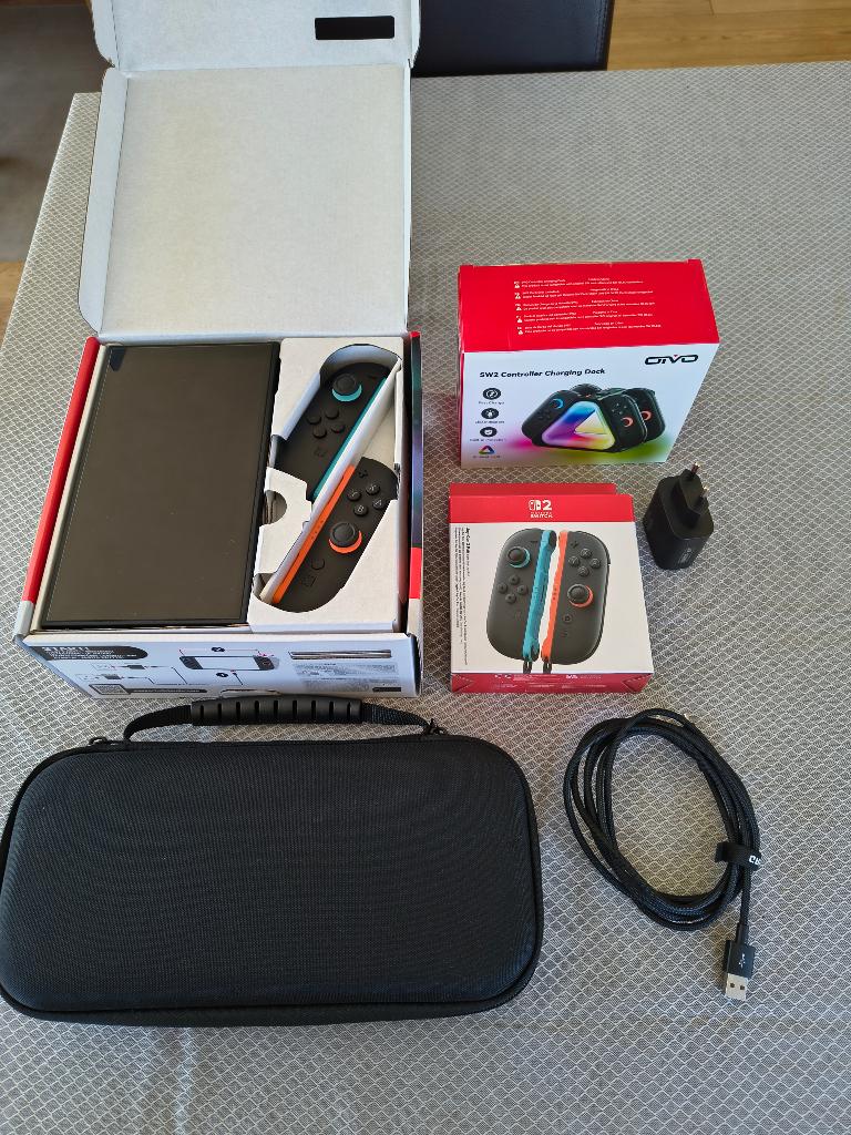 Nintendo switch 2 met extra joy cons, oplader en draagtas, Ophalen, Zo goed als nieuw, Met 2 controllers, Switch OLED