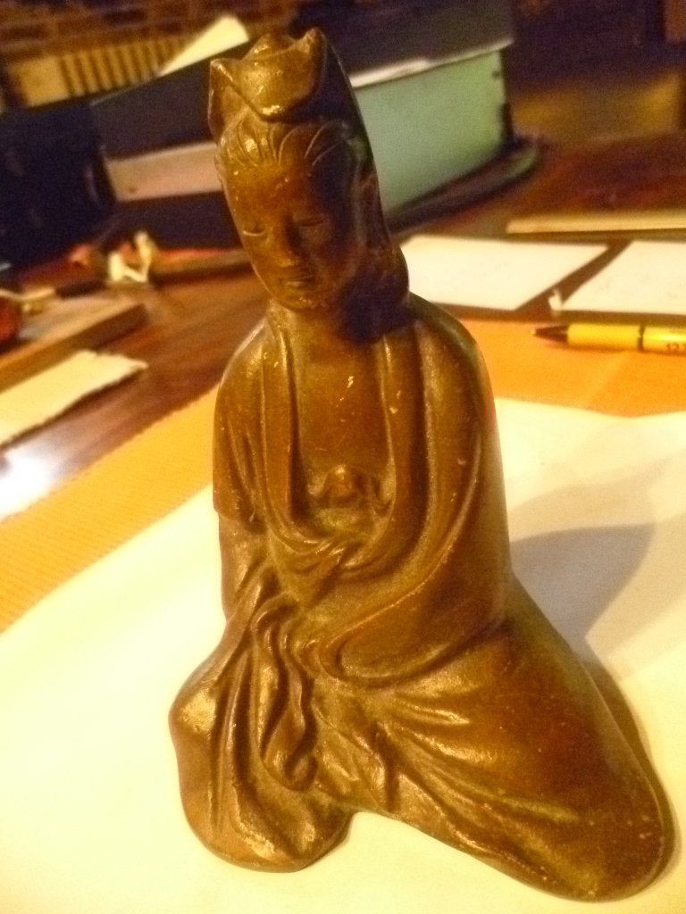 bronzen boeddha beeld, Ophalen