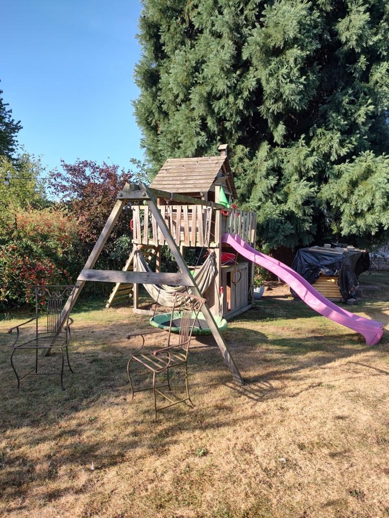 Schommel met speeltoren en glijbaan, Ophalen