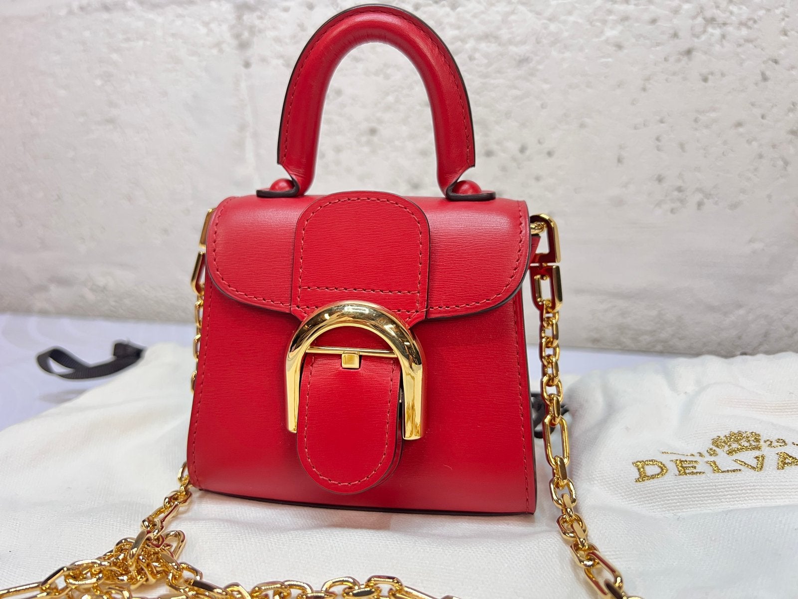 DELVAUX DE LE BRILLANT RODE STOFZAK MET KETTING - DUSTBAG, Ophalen of Verzenden, Zo goed als nieuw